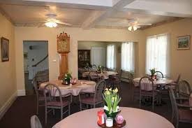 Hearthstone Retirement Home dining room set with tables and chairs
