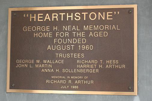 Historical plaque commemorating Hearthstone Retirement Home, mounted on the building